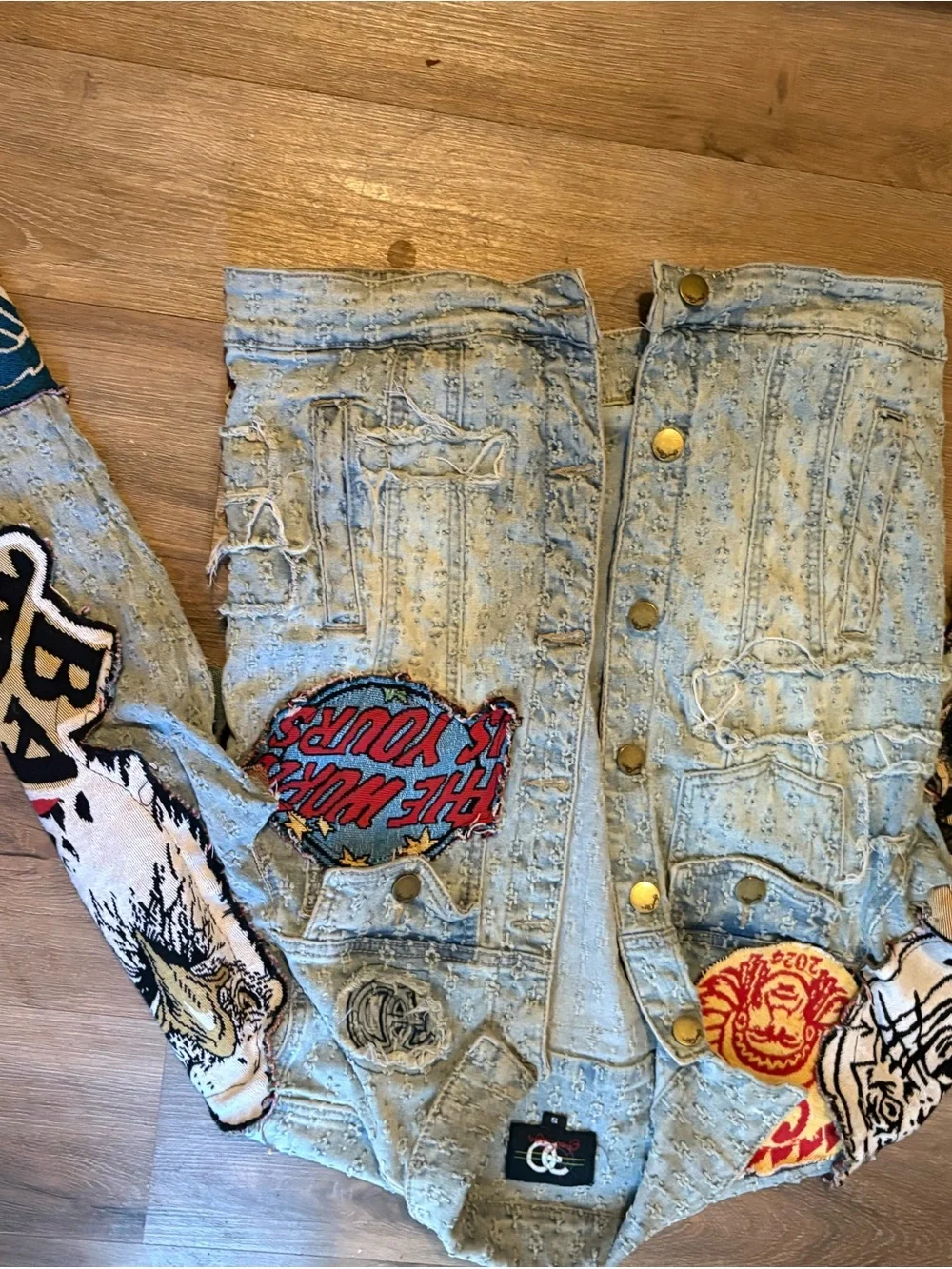Free People Light Wash Distressed Denim Jacket with Embroidered Skull Patch - Picture 2 of 3